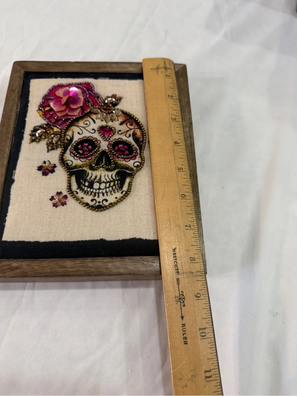 Embellished Sugar Skull Art with Pink Floral Accent